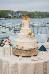 NJ wedding reception, reception details, wood reception details, wedding inspiration, Crystal Point Yacht Club wedding reception, wedding cake, wedding cake with flowers