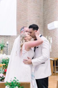 first kiss ceremony photo, newlywed first kiss photos