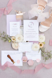 wedding invitation and wedding details flat lay