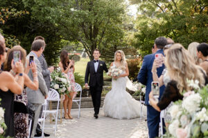 bride walking down the aisle during outdoor NJ ceremony