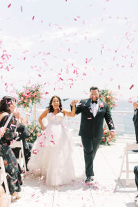 bride and groom confetti ceremony exit