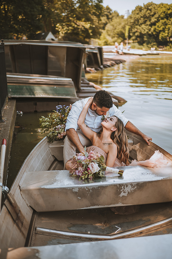 CWeddingsMag.com | couple looking into each other's eyes during rowboat engagement session in Central Park