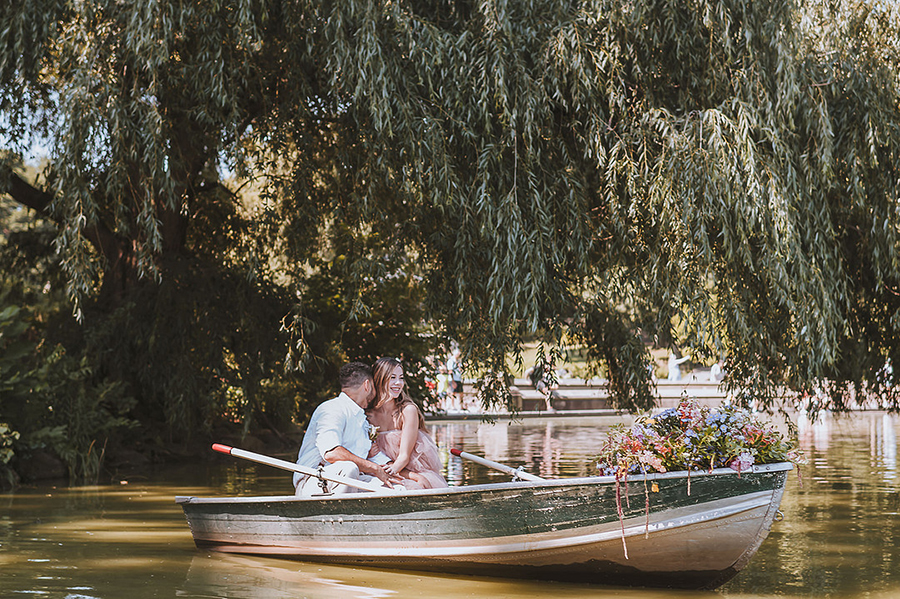 CWeddingsMag.com | bride laughing in rowboat during NY engagement session in Central Park