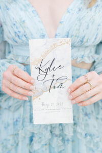 modern marble and blue ceremony programs