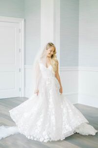 bride twirling her Pnina Tornai wedding gown