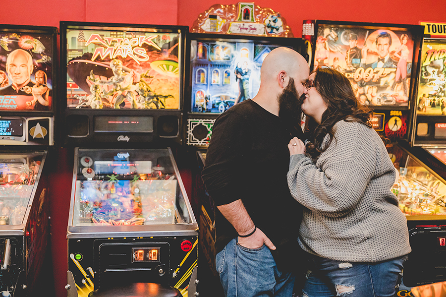 couple kissing at Yestercades during engagement session