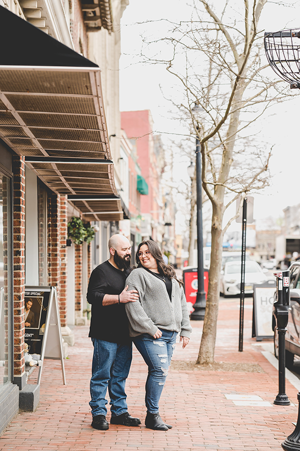 couple posing in downtown Red Bank during engagement session