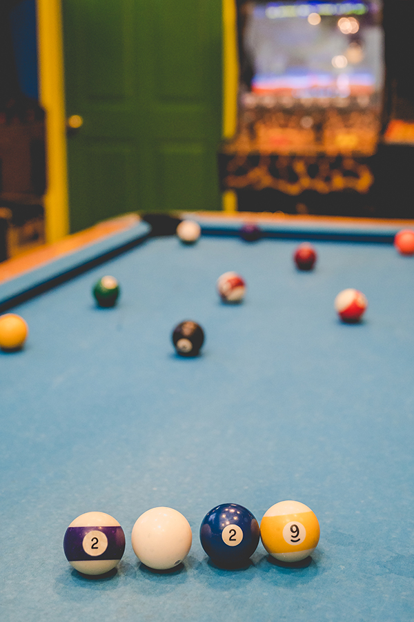 pool balls announcing couple's wedding date