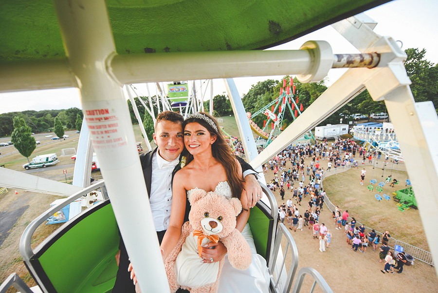 newlyweds wedding portrait on ferris wheel at local NJ carnival