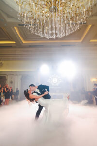 newlyweds dancing on the clouds in Park Chateau ballroom