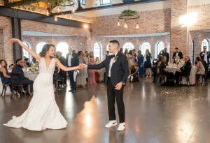 newlyweds first dance in Perona Farms ballroom