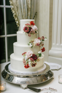 classic white wedding cake with flowers, white four tier wedding cake, The Bake Works NJ